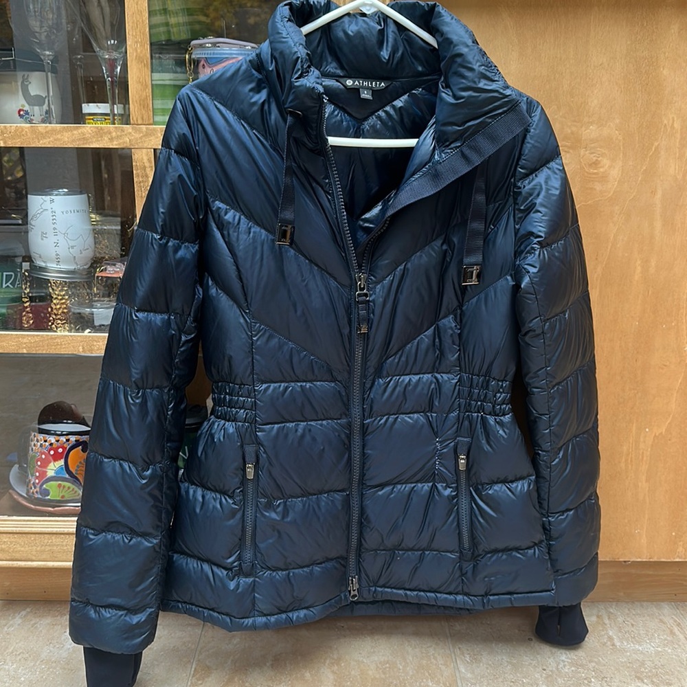 Navy blue coat by Athleta lightly worn.